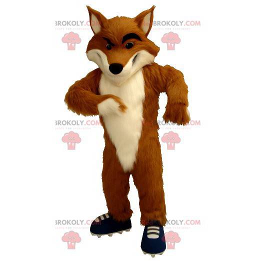 Mascotte de renard orange et blanc avec des baskets -