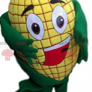 Mascotte di orecchio di mais giallo avido e sorridente -