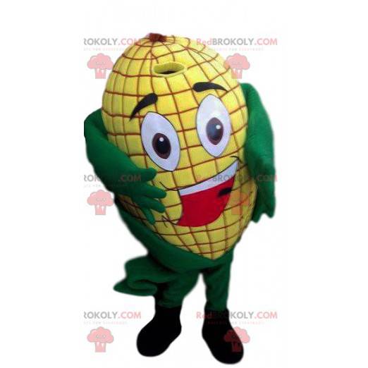 Mascota de mazorca de maíz amarillo codicioso y sonriente -