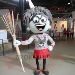 Gray Knife Thrower mascot costume character dressed with a Pencil Skirt and Eyeglasses