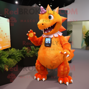 Orange Stegosaurus mascot costume character dressed with a Dress and Smartwatches