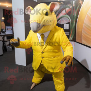 Yellow Armadillo mascot costume character dressed with a Jacket and Ties