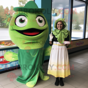 Green Fish Tacos mascot costume character dressed with a Maxi Dress and Wraps