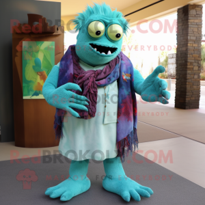 Turquoise Frankenstein'S Monster mascot costume character dressed with a Henley Shirt and Scarf clips