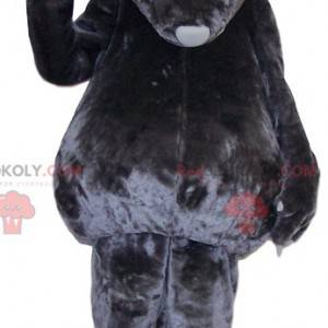 Šedý vačnatec maskot dotýká - Redbrokoly.com