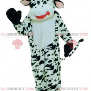 Mascote de vaca preto e branco com chifres amarelos -