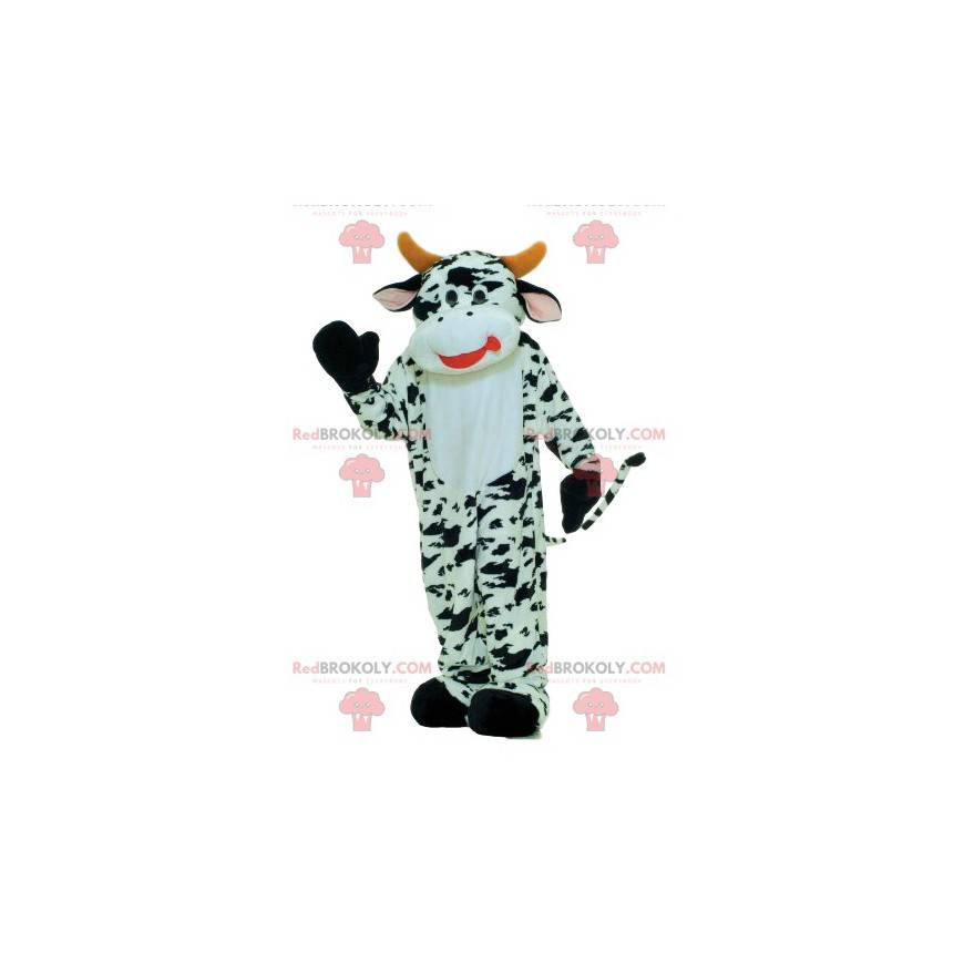 Mascote de vaca preto e branco com chifres amarelos -
