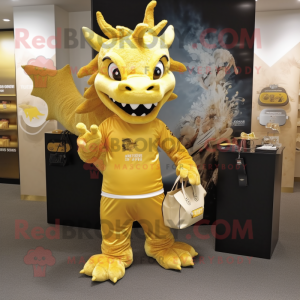 Gold Dragon mascot costume character dressed with a T-Shirt and Tote bags