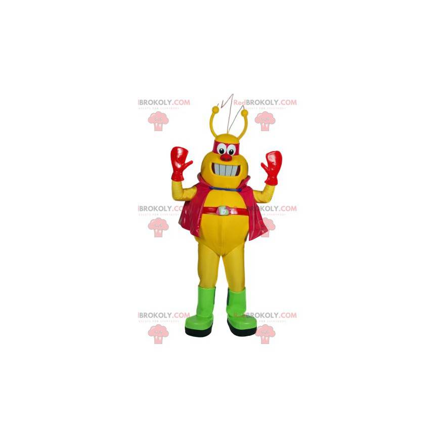 Mascota de insecto amarillo con su capa y diadema roja -