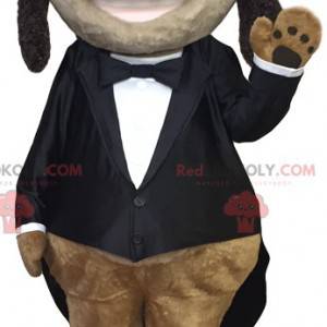 Mascote dachshund alegre em traje preto elegante -