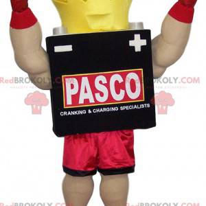 Maskot boxer s jeho žlutou korunou a červené šortky -