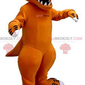 Mascotte de dinosaure orange et blanc avec de grandes dents -