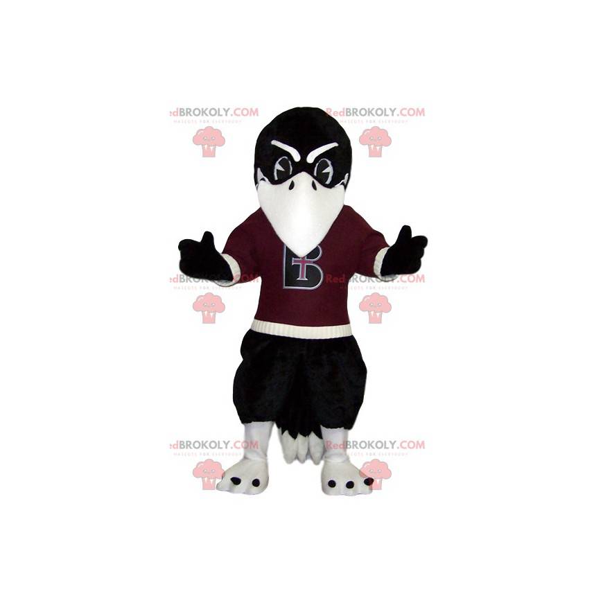 Mascotte d'aigle noir avec son maillot de supporter bordeaux -