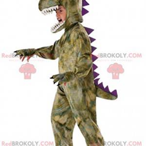 Mascota Tyrex con su hermoso escudo morado - Redbrokoly.com