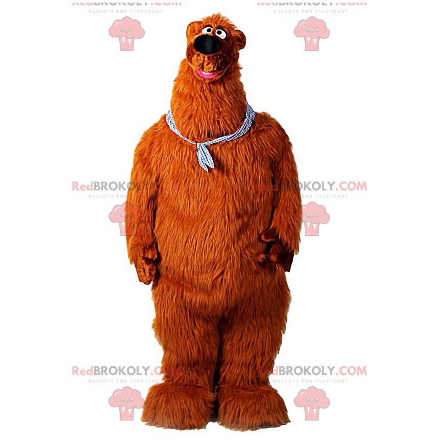 Giant brown bear mascot with a bandana around his neck -