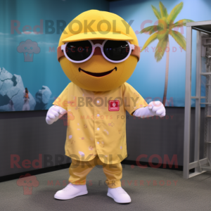 Gold Cherry mascot costume character dressed with a Baseball Tee and Sunglasses