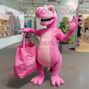 Pink Iguanodon mascot costume character dressed with a V-Neck Tee and Tote bags