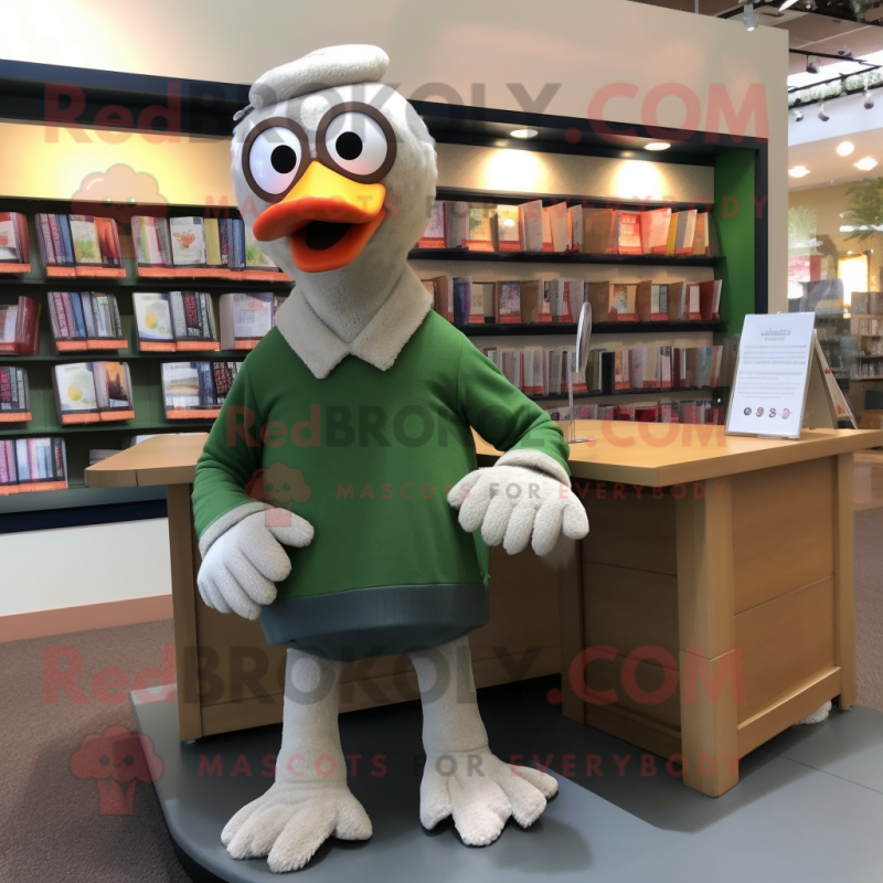 Olive Goose mascot costume character dressed with a Sweater and Reading glasses