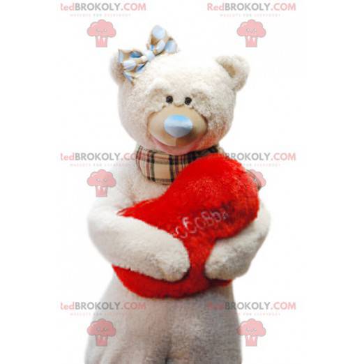 Mascot beige bear cuddly with its red "Heart" cushion -