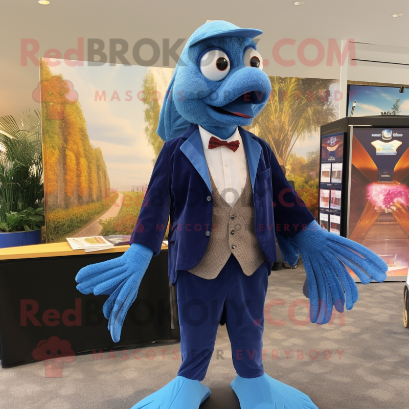 Blue Betta Fish mascot costume character dressed with a Blazer and Cummerbunds Blue Betta Fish mascot costume character dressed with a Blazer and Cummerbunds