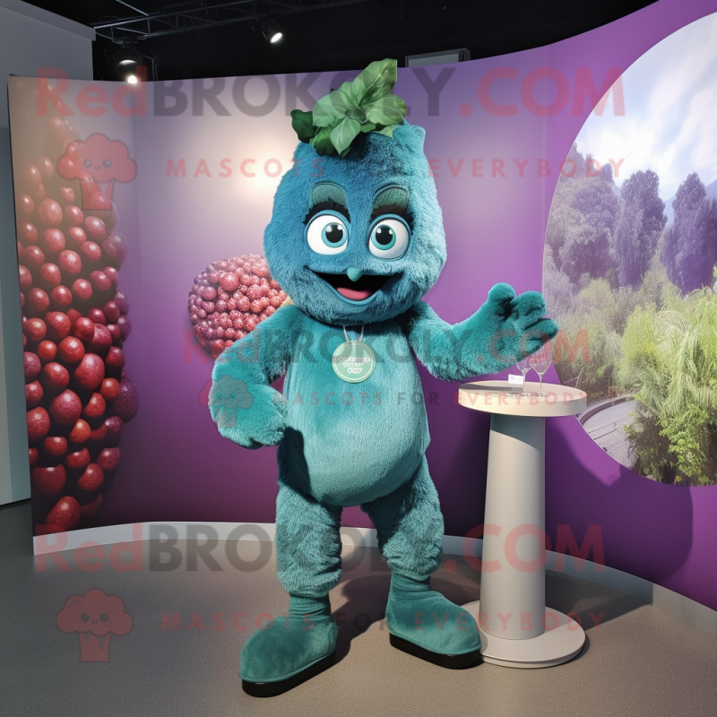Teal Grape mascot costume character dressed with a Graphic Tee and Cummerbunds Teal Grape mascot costume character dressed with a Graphic Tee and Cummerbunds