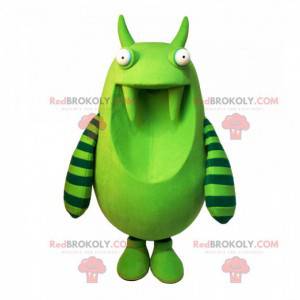 Mascote gigante monstro verde com dentes grandes -