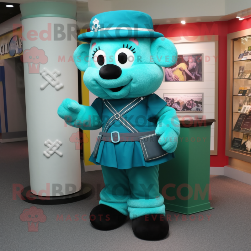 Teal Celtic Cross mascot costume character dressed with a Pencil Skirt and Caps Teal Celtic Cross mascot costume character dressed with a Pencil Skirt and Caps