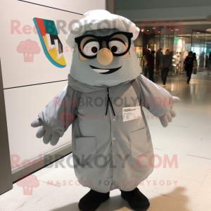 Silver Lasagna mascot costume character dressed with a Raincoat and Eyeglasses