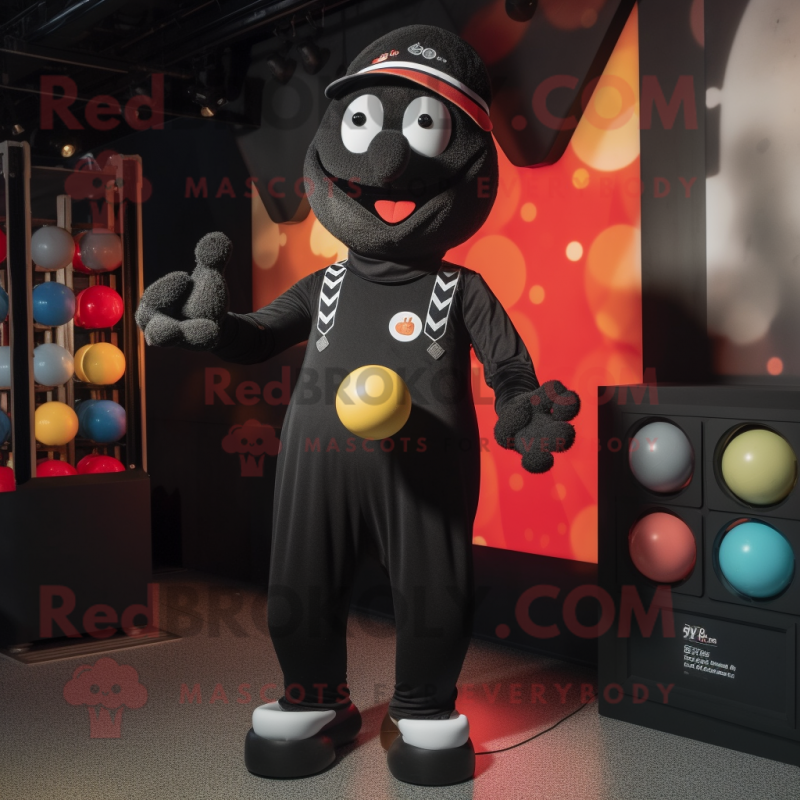 Black Juggle mascot costume character dressed with a Graphic Tee and Suspenders