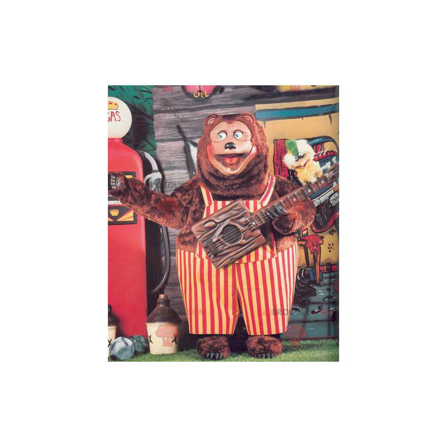 Big brown bear mascot with red and yellow overalls -