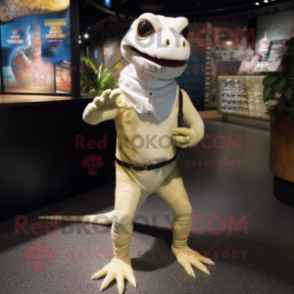 Cream Lizard mascot costume character dressed with a Jeggings and Brooches