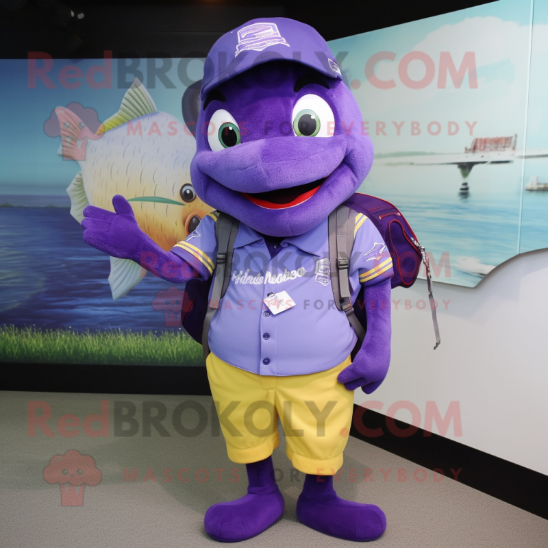 Purple Tuna mascot costume character dressed with a Polo Shirt and Messenger bags