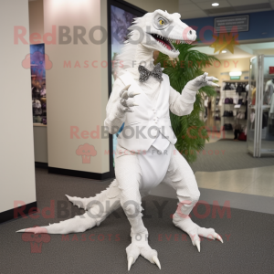 White Utahraptor mascot costume character dressed with a Dress Pants and Earrings