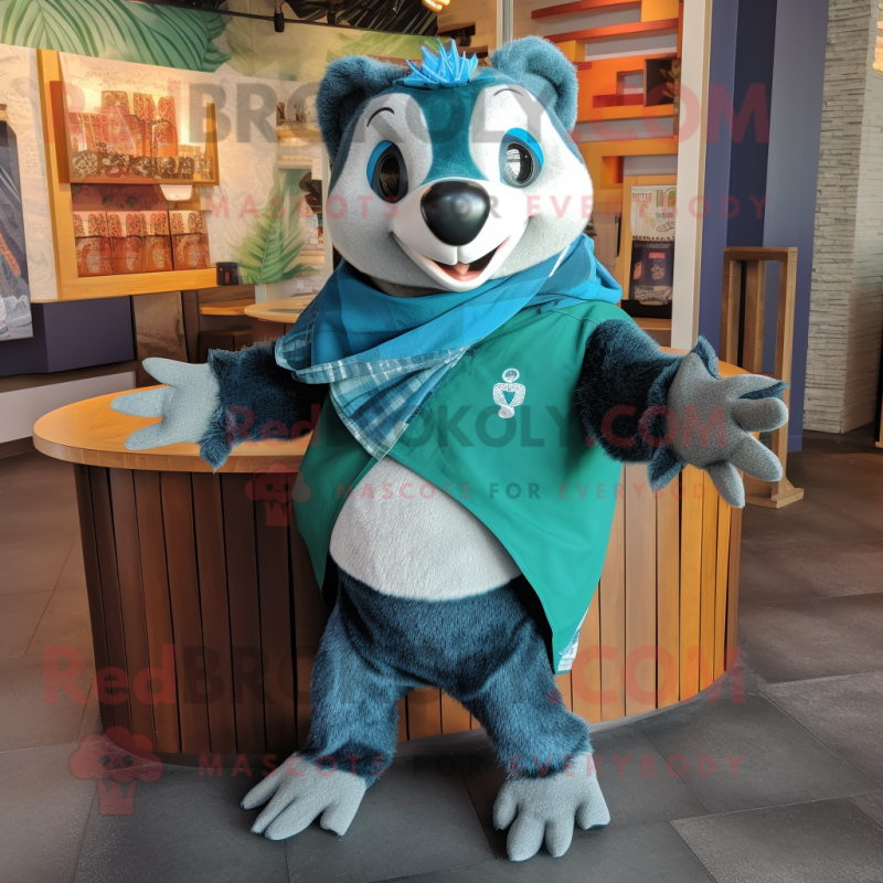Turquoise Badger mascot costume character dressed with a Jeans and Shawl pins Turquoise Badger mascot costume character dressed with a Jeans and Shawl pins