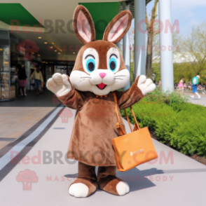 Brown Rabbit mascot costume character dressed with a Shift Dress and Tote bags