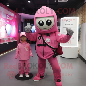 Pink Soldier mascot costume character dressed with a Hoodie and Smartwatches