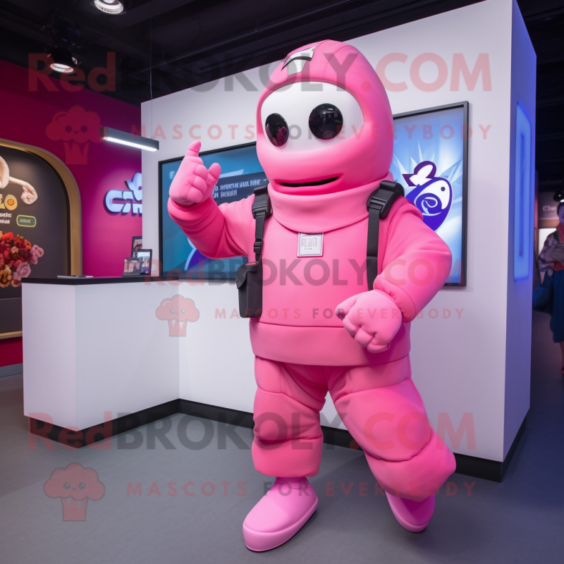 Pink Soldier mascot costume character dressed with a Hoodie and Smartwatches