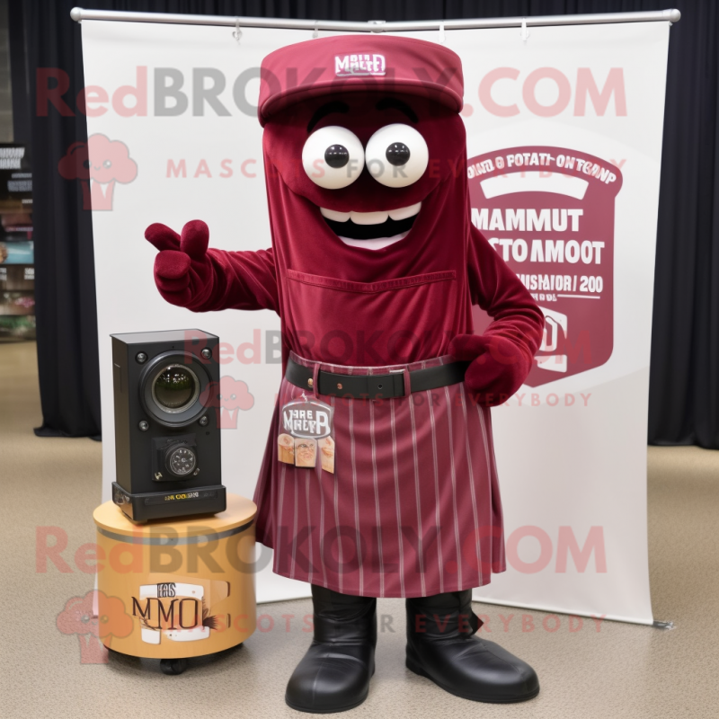 Maroon Camera mascot costume character dressed with a Oxford Shirt and Shawl pins