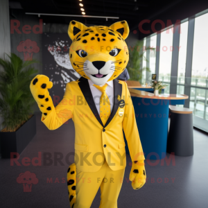 Yellow Cheetah mascot costume character dressed with a Blazer and Lapel pins