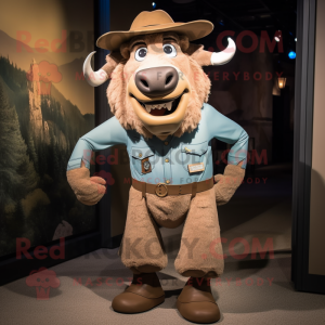 Tan Bison mascot costume character dressed with a Chambray Shirt and Suspenders