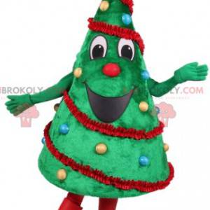 Grøn gran maskot med sin juledekoration - Redbrokoly.com