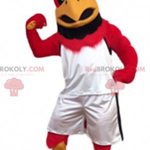 Obří červený orel maskot s jeho sportovní oblečení -