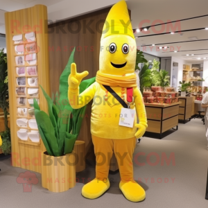 Yellow Asparagus mascot costume character dressed with a Corduroy Pants and Clutch bags
