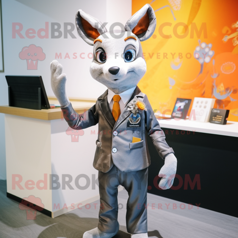 Silver Roe Deer mascot costume character dressed with a Suit Jacket and Wallets