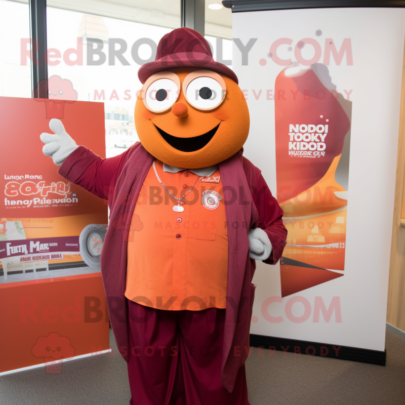 Maroon Orange mascot costume character dressed with a Button-Up Shirt and Shawl pins