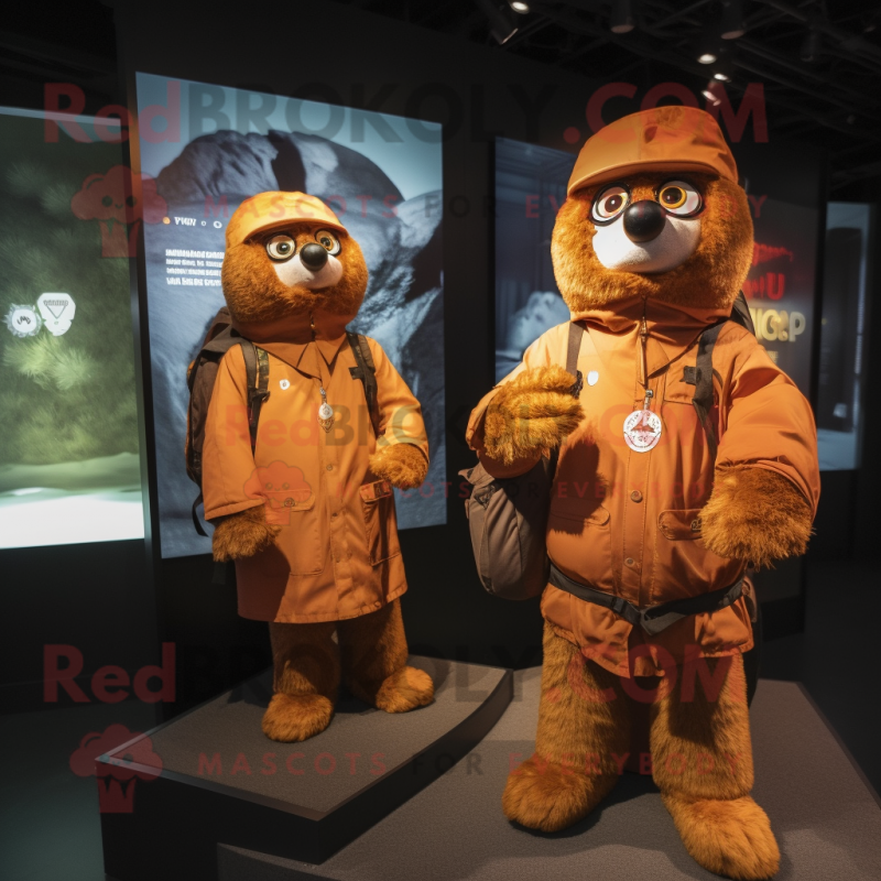 Rust Engagement Ring mascot costume character dressed with a Parka and Backpacks Rust Engagement Ring mascot costume character dressed with a Parka and Backpacks