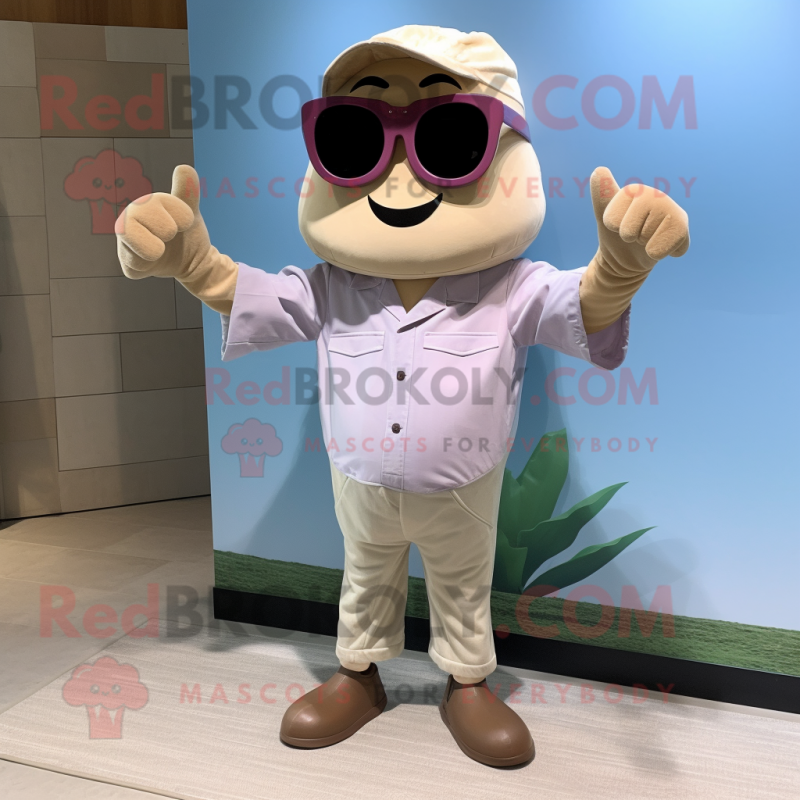 Beige Plum mascot costume character dressed with a Chambray Shirt and Sunglasses Beige Plum mascot costume character dressed with a Chambray Shirt and Sunglasses