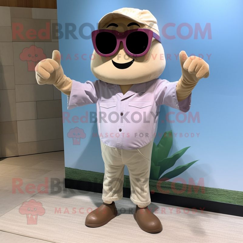 Beige Plum mascot costume character dressed with a Chambray Shirt and Sunglasses