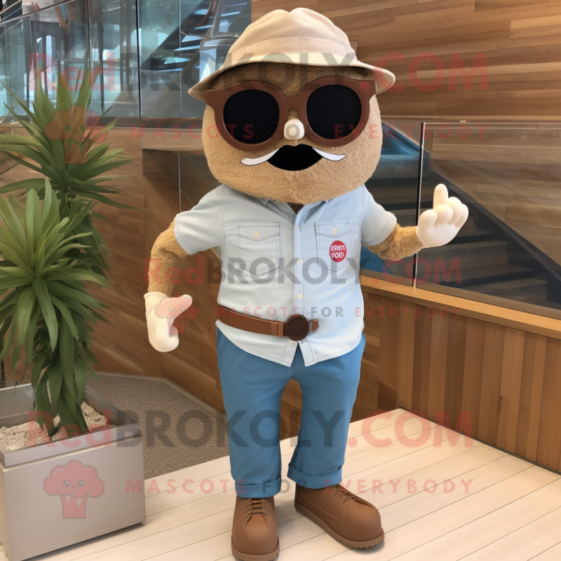Beige Plum mascot costume character dressed with a Chambray Shirt and Sunglasses Beige Plum mascot costume character dressed with a Chambray Shirt and Sunglasses