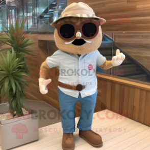 Beige Plum mascot costume character dressed with a Chambray Shirt and Sunglasses